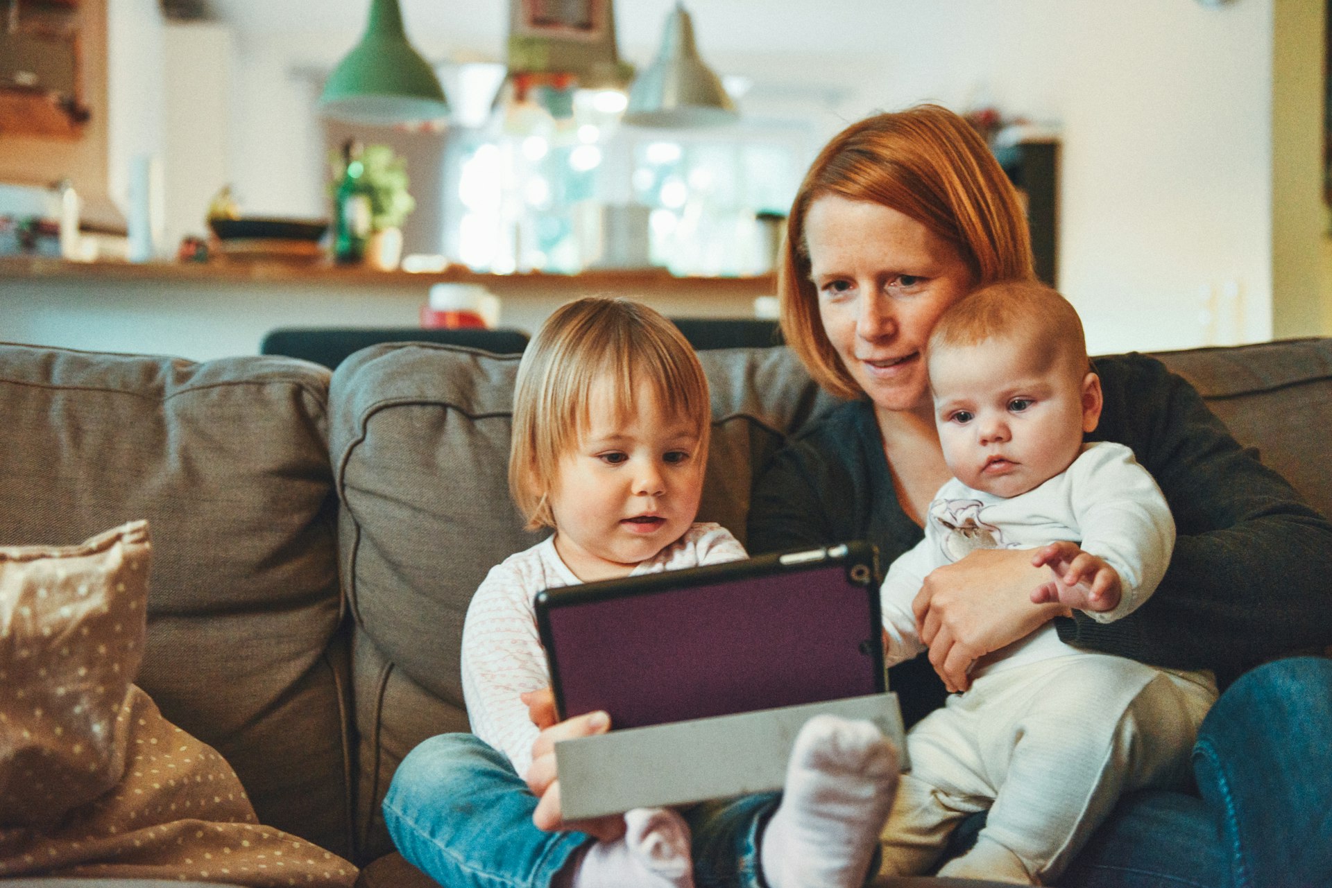 A young mother spending time with her children